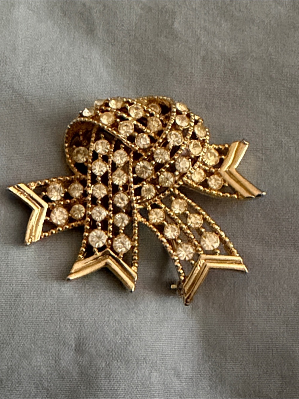 Gold-Tone Crystal Bow Brooch - Elegant Women's Jewelry